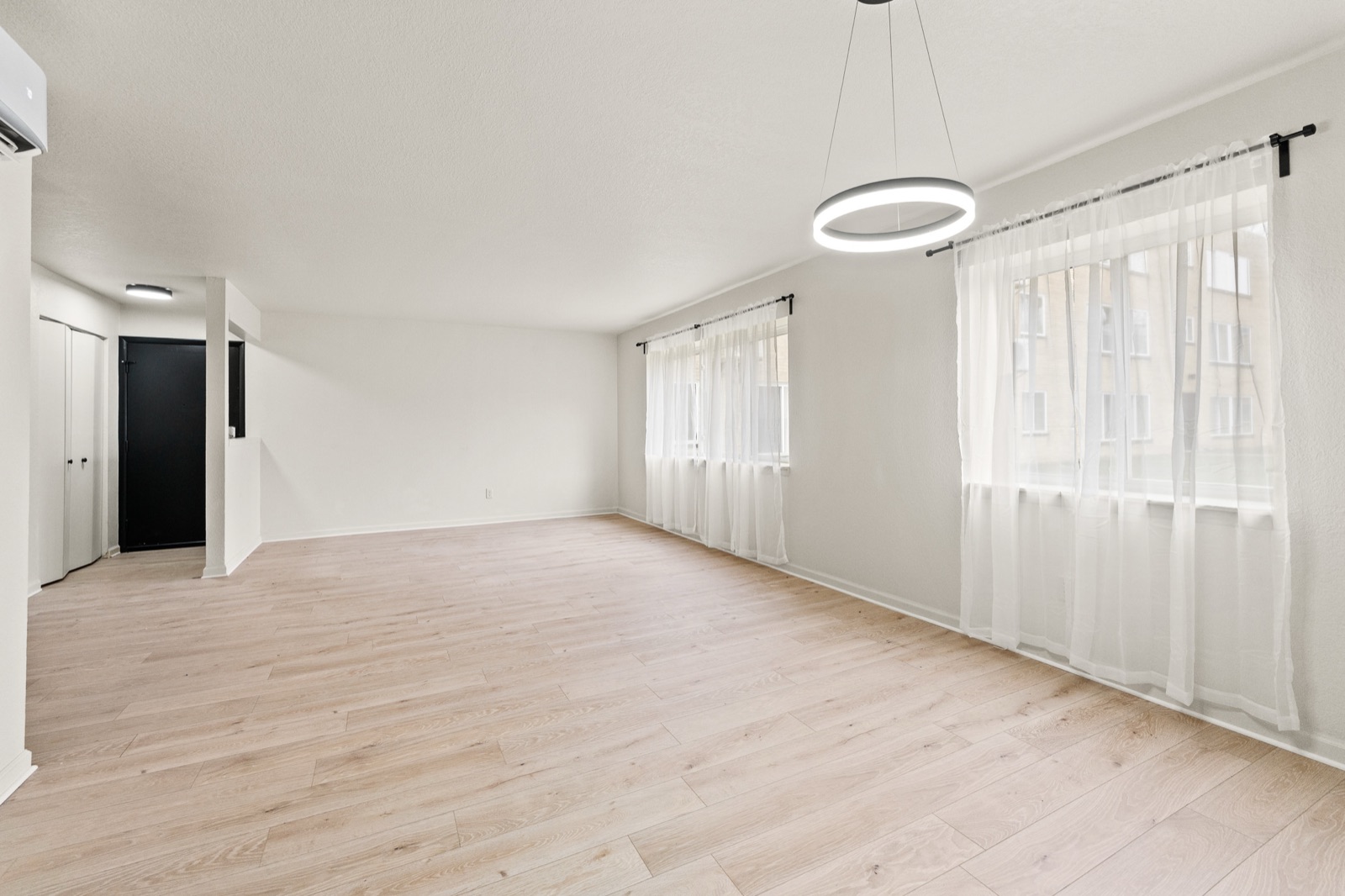 Wide living room with natural light