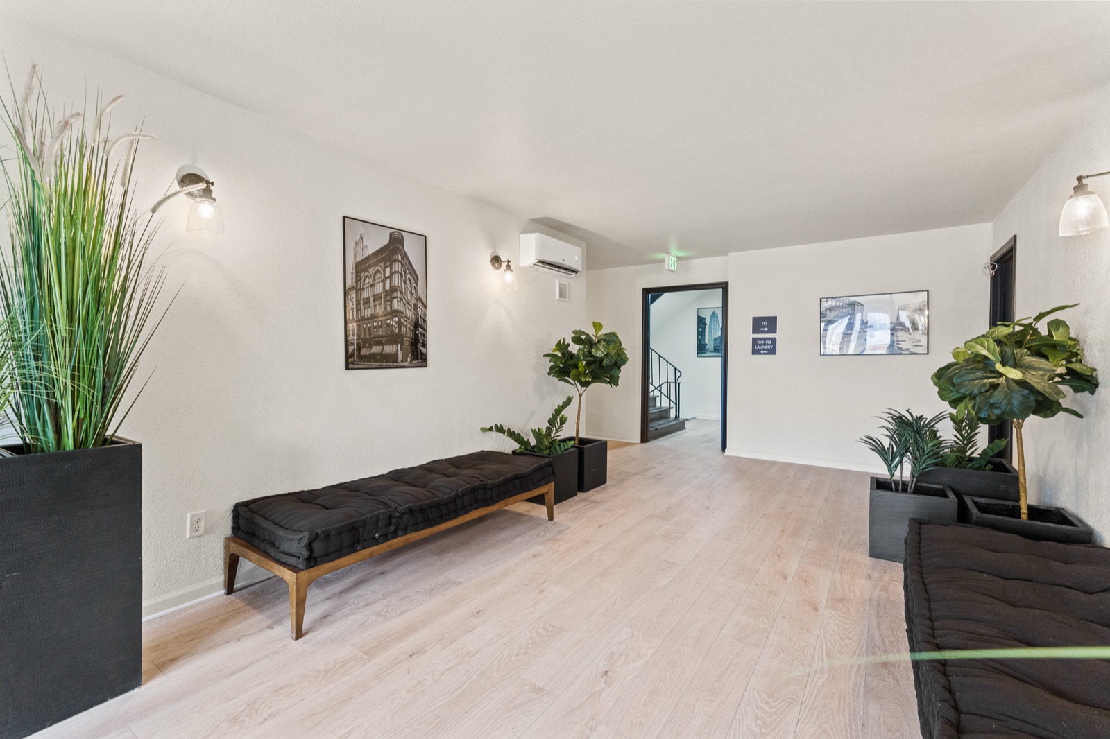 Lobby with plants and artwork